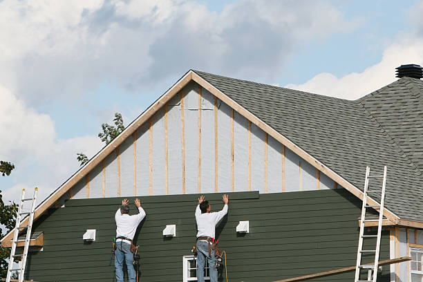 Professional Siding Installation technician working in Troy, NC